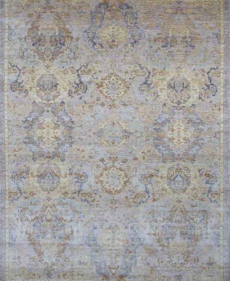 Traditional all-over patterned hand-knotted area rug in blue.