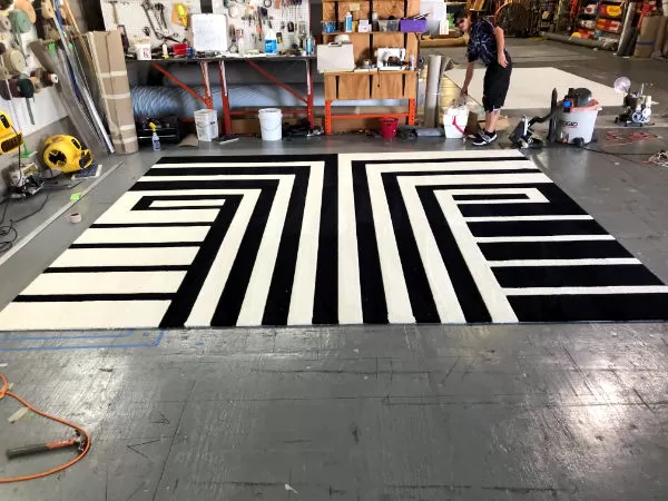 Black and white rug in alternating layout