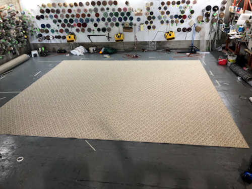 Seamed rug with invisible joint