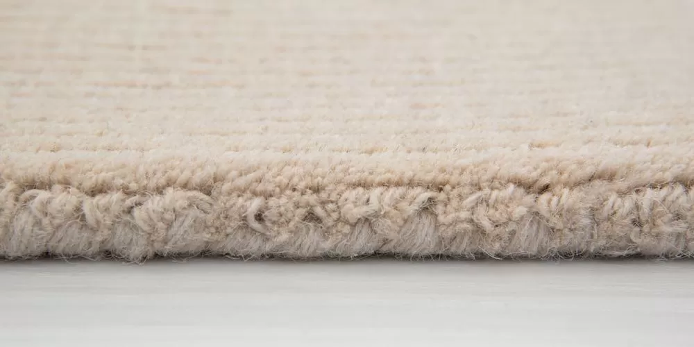 Hand serged rug.