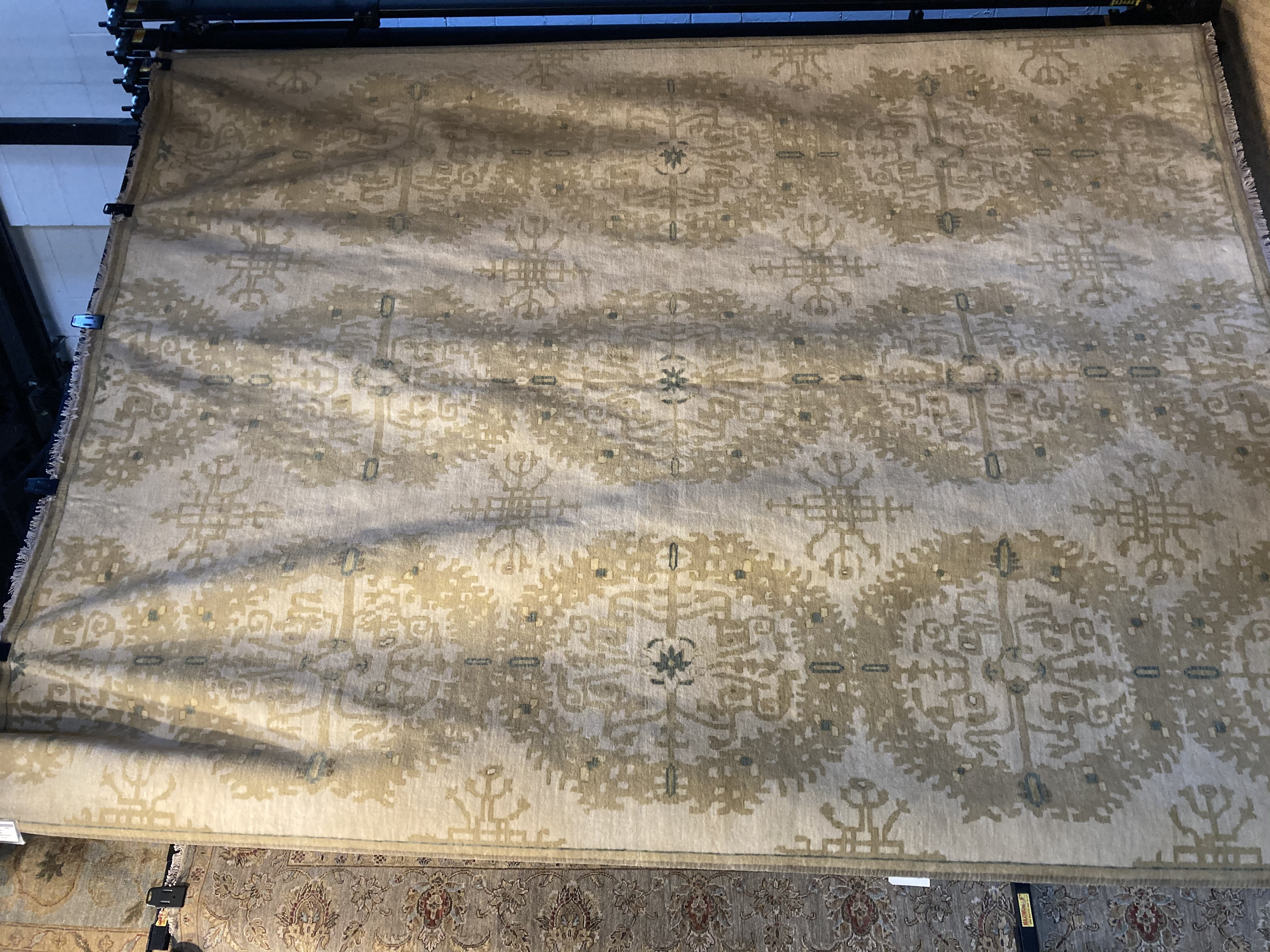 Hand-knotted area rug in ivory/beige 9x12