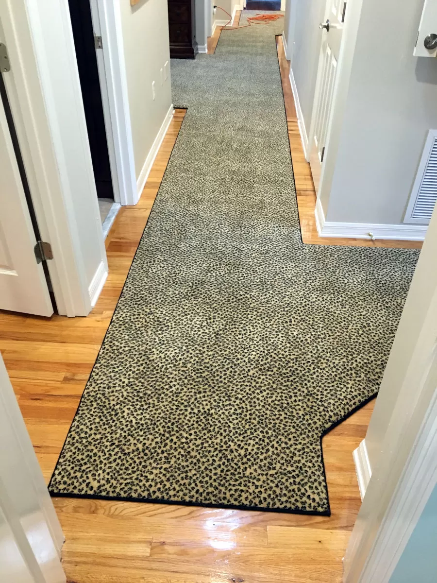 Odd shaped hall runner with serging.