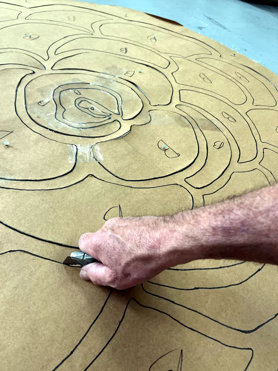 Large pattern for flower in a rug.