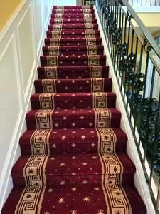 Stair runner made from rug.