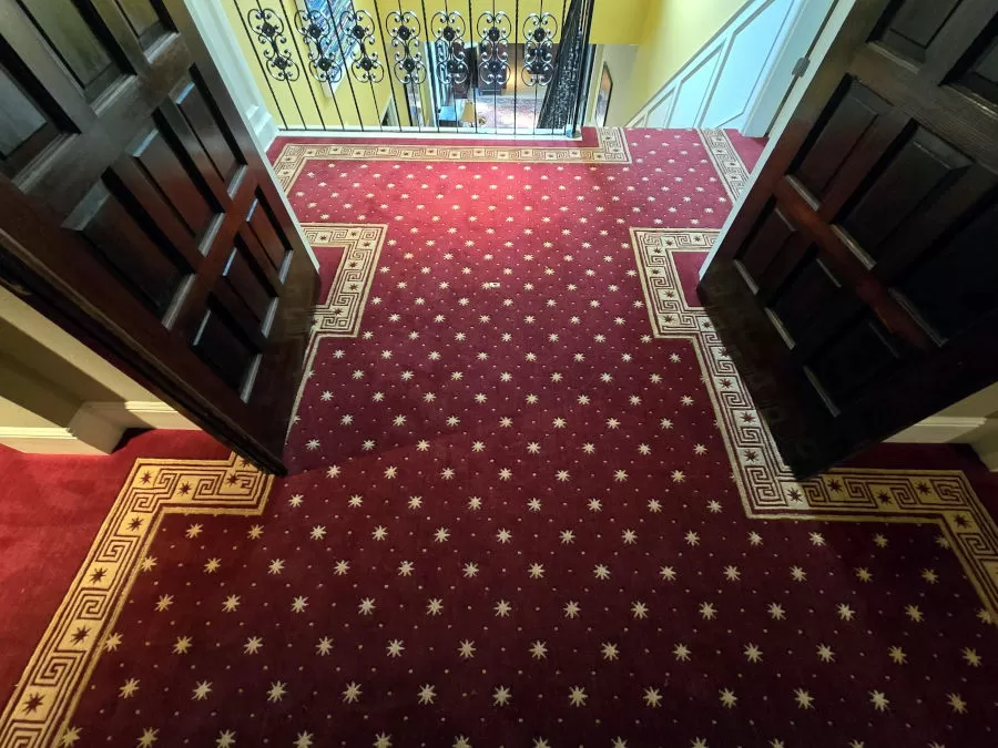 Carpet from rug on stair landing