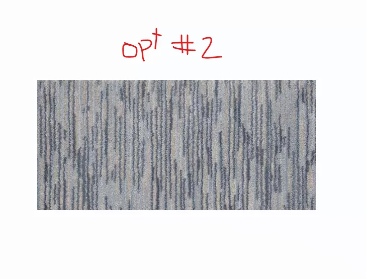 Fabricated rug with pattern perpendicular to the long side
