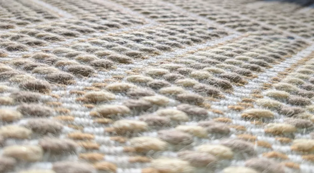 Hand-loomed carpet surface - two yarns.
