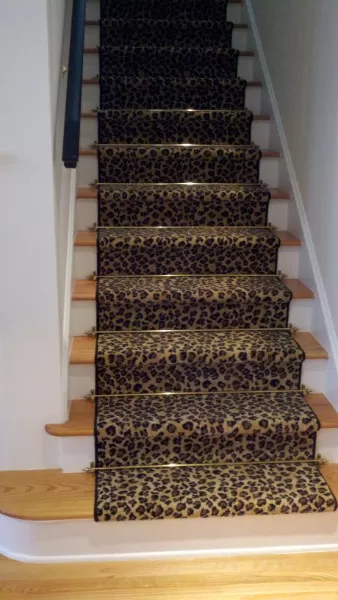 Leopard pattern runner with stair rods