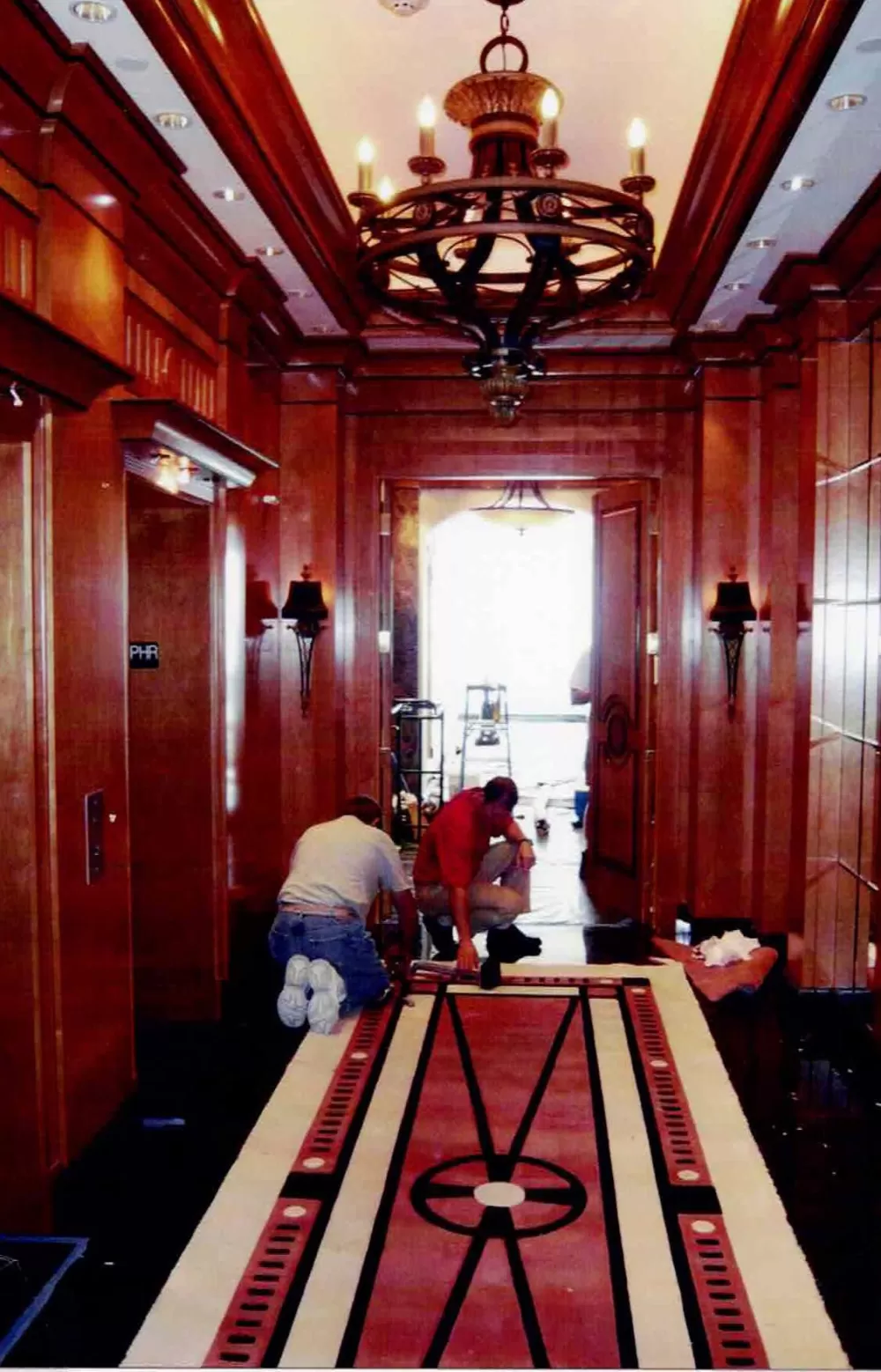 Complex inlaid elevator lobby formatted rug