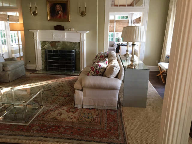 Formatted sisal rug with hand-knotted rug on top