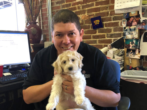 Mike Bailey of Addison/Dicus and Bailey holding Ryder