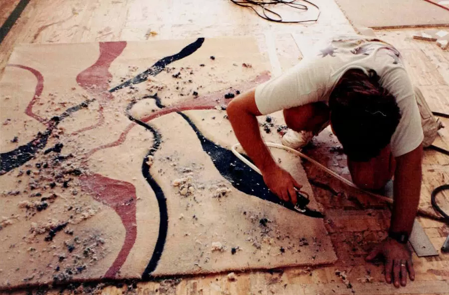 Shaving a formatted rug to give it texture and perspective.