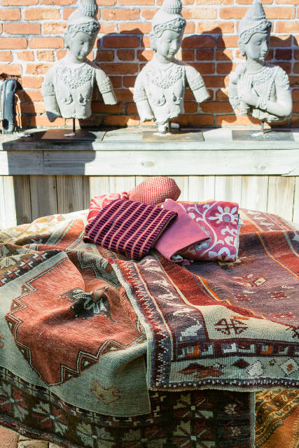 Anatolian rugs matched with marsala-themed fabric in Artifacts Garden - portrait format.