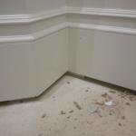 Improperly elevated baseboards for carpet installation