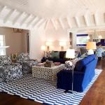 Flatweave rug in blue anchoring a sitting room