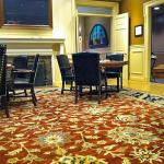 Russet rug with floral pattern with furniture