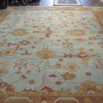 Oushak rug in blue and brown