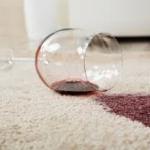 Red wine spilled on carpet.